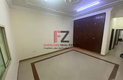 Empty Room image for: Villa - 3 Bedrooms - 3 Bathrooms for rent in Al Hanaa Street - Al Gharrafa - Doha, Image 1
