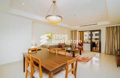 Living / Dining Room image for: Apartment - 2 Bedrooms - 3 Bathrooms for rent in West Porto Drive - Porto Arabia - The Pearl Island - Doha, Image 1