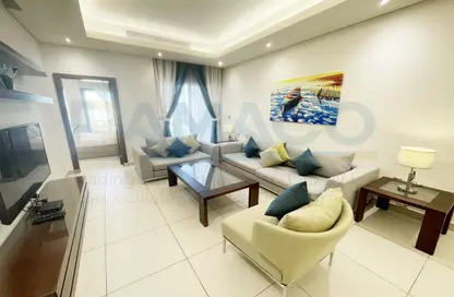 صورة لـ غرفة المعيشة شقة - 2 غرف نوم - 2 حمامات للايجار في راس ابو عبود - الدوحة ، صورة رقم 1