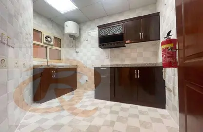 Kitchen image for: Apartment - 2 Bedrooms - 2 Bathrooms for rent in Abu Talha Street - Fereej Bin Omran - Doha, Image 1