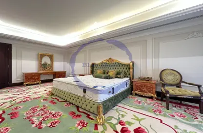 صورة لـ غرفة- غرفة النوم (بنتهاوس  (روف - 5 غرف نوم للبيع في طريق بورتو الغربي - بورتو أرابيا - جزيرة اللؤلؤة - الدوحة ، صورة رقم 1