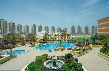 Pool image for: Apartment - 3 Bedrooms - 3 Bathrooms for sale in Viva West - Viva Bahriyah - The Pearl Island - Doha, Image 1