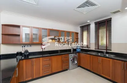 Kitchen image for: Compound - 2 Bedrooms - 3 Bathrooms for rent in West Bay Lagoon Street - West Bay Lagoon - Doha, Image 1
