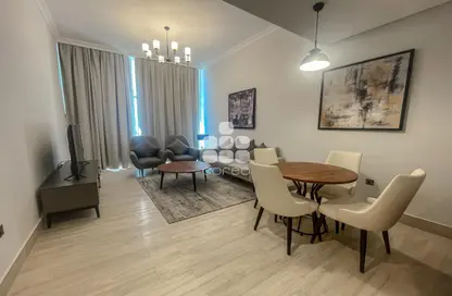 Living / Dining Room image for: Apartment - 1 Bedroom - 2 Bathrooms for rent in Velero Hotel - Marina District - Lusail, Image 1