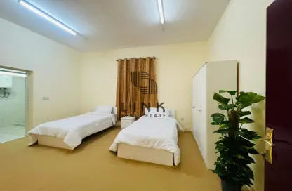صورة لـ غرفة- غرفة النوم فيلا للايجار في منطقة مويثر - الريان - الدوحة ، صورة رقم 1