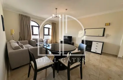Living / Dining Room image for: Apartment - 1 Bedroom - 1 Bathroom for rent in Umm Ghwailina Comm - Umm Ghuwalina - Umm Ghuwailina - Doha, Image 1