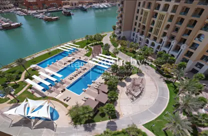 Pool image for: Duplex - 3 Bedrooms - 4 Bathrooms for rent in The St. Regis Marsa Arabia Island - Marsa Arabia - The Pearl Island - Doha, Image 1
