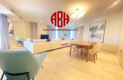 Living / Dining Room image for: Apartment - 3 Bedrooms - 4 Bathrooms for rent in Baraha North 2 - Baraha North Apartments - Msheireb Downtown Doha - Doha, Image 1