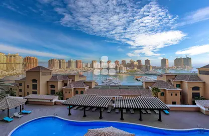 Pool image for: Apartment - 1 Bedroom - 2 Bathrooms for rent in Sabban Towers - Porto Arabia - The Pearl Island - Doha, Image 1