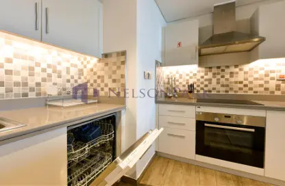 Kitchen image for: Apartment - 1 Bedroom - 2 Bathrooms for rent in Viva Bahriyah - The Pearl Island - Doha, Image 1