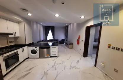 صورة لـ مطبخ شقة - غرفة نوم - 2 حمامات للايجار في مدينة قطر الترفيهية - الوسيل ، صورة رقم 1