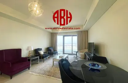 Living / Dining Room image for: Apartment - 2 Bedrooms - 3 Bathrooms for rent in Burj DAMAC Marina - Marina District - Lusail, Image 1