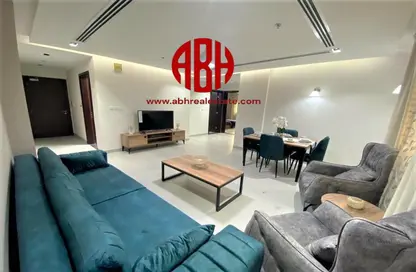 Living / Dining Room image for: Apartment - 1 Bedroom - 2 Bathrooms for rent in Downtown - Downtown - Qatar Entertainment City - Lusail, Image 1