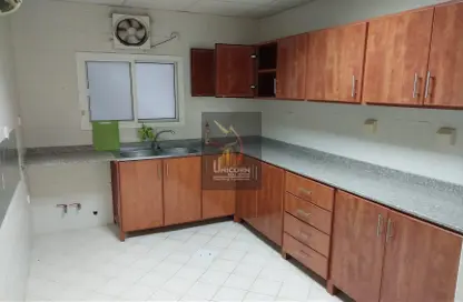 Kitchen image for: Apartment - 3 Bedrooms - 3 Bathrooms for rent in Ibn Asakir Street - Najma - Doha, Image 1