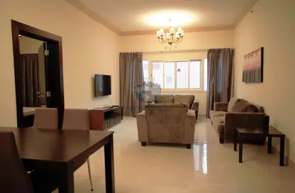 Living / Dining Room image for: Apartment - 2 Bedrooms - 3 Bathrooms for rent in Al Sadd - Al Sadd - Doha, Image 1