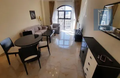 صورة لـ غرفة المعيشة / غرفة الطعام شقة - غرفة نوم - 1 حمام للايجار في ام غوالينا تجارية - ام غويلينا - أم غويلينا - الدوحة ، صورة رقم 1