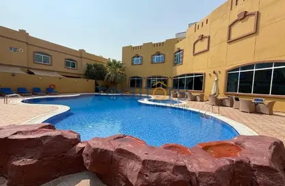 Compound - 4 Bedrooms - 5 Bathrooms for rent in Bu Hamour Street - Abu Hamour - Doha