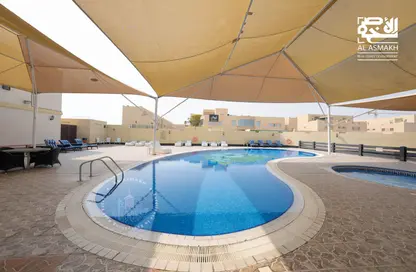 صورة لـ حوض سباحة فيلا - 5 غرف نوم - 3 حمامات للايجار في مجمع فيلات إستيت - الوعب - الوعب - الدوحة ، صورة رقم 1
