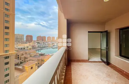صورة لـ شرفة شقة - غرفة نوم - 2 حمامات للايجار في بوابة المارينا - بورتو أرابيا - جزيرة اللؤلؤة - الدوحة ، صورة رقم 1