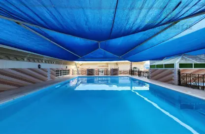 صورة لـ حوض سباحة شقة - 2 غرف نوم - 3 حمامات للايجار في أم غويلينا - الدوحة ، صورة رقم 1
