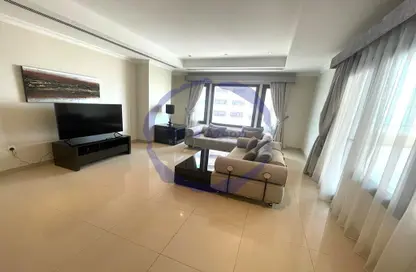 صورة لـ غرفة المعيشة شقة - غرفة نوم - 2 حمامات للايجار في طريق بورتو الشرقي - بورتو أرابيا - جزيرة اللؤلؤة - الدوحة ، صورة رقم 1
