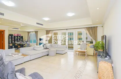 Living Room image for: Apartment - 3 Bedrooms - 5 Bathrooms for sale in West Porto Drive - Porto Arabia - The Pearl Island - Doha, Image 1