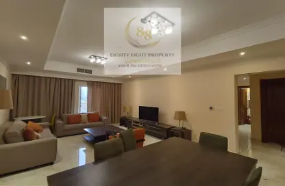 Living / Dining Room image for: Apartment - 2 Bedrooms - 2 Bathrooms for rent in Ghanem Business Centre - Fereej Bin Mahmoud South - Fereej Bin Mahmoud - Doha, Image 1