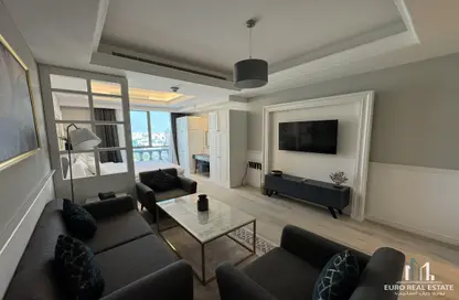 Living Room image for: Apartment - 1 Bathroom for rent in Bin Al Sheikh Towers - Al Mirqab Al Jadeed - Doha, Image 1