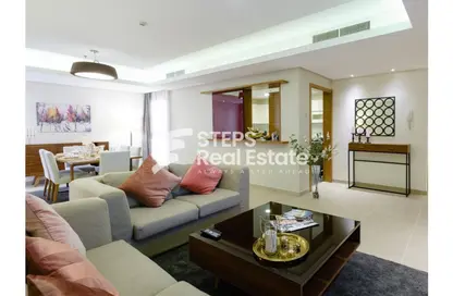 Living / Dining Room image for: Apartment - 2 Bedrooms - 3 Bathrooms for rent in Le mirage corniche - Ras Abu Aboud - Doha, Image 1