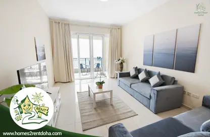 Living / Dining Room image for: Apartment - 2 Bedrooms - 3 Bathrooms for rent in Tower 29 - Viva Bahriyah - The Pearl Island - Doha, Image 1