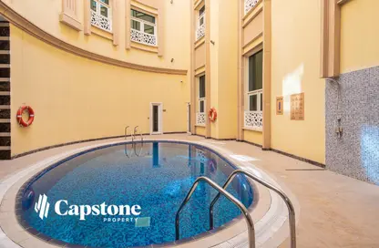 صورة لـ حوض سباحة شقة - غرفة نوم - 2 حمامات للايجار في شارع المطار القديم - طريق المطار القديم - الدوحة ، صورة رقم 1