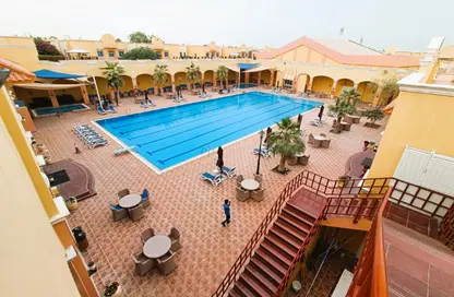 Compound - 4 Bedrooms - 5 Bathrooms for rent in Abu Sidra - Al Rayyan - Doha