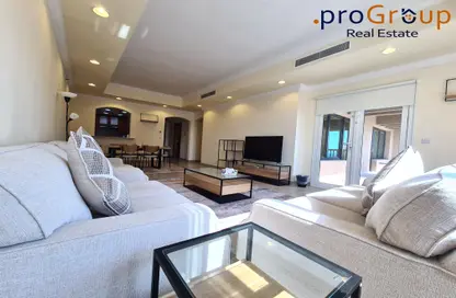 Living Room image for: Apartment - 2 Bedrooms - 3 Bathrooms for rent in East Porto Drive - Porto Arabia - The Pearl Island - Doha, Image 1