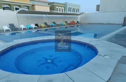 صورة لـ حوض سباحة مجمع سكني - 7 غرف نوم - 6 حمامات للايجار في شارع  بو هامو - أبو هامور - الدوحة ، صورة رقم 1