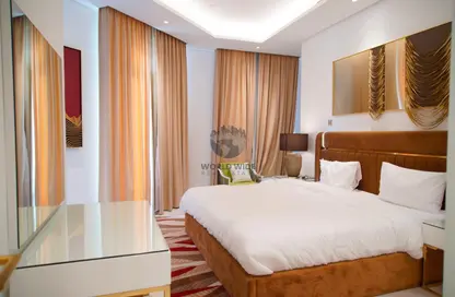 صورة لـ غرفة- غرفة النوم شقة - 2 غرف نوم - 4 حمامات للايجار في حدائق فلورستا - حدائق فلورستا - جزيرة اللؤلؤة - الدوحة ، صورة رقم 1