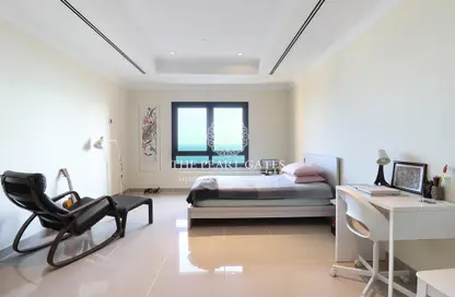 Room / Bedroom image for: Apartment - 1 Bathroom for sale in East Porto Drive - Porto Arabia - The Pearl Island - Doha, Image 1