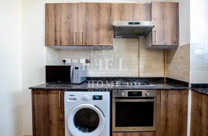 صورة لـ مطبخ شقة - 2 غرف نوم - 2 حمامات للايجار في مدينة اللسيل - الوسيل ، صورة رقم 1