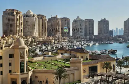 Outdoor Building image for: Apartment - 1 Bedroom - 2 Bathrooms for sale in Porto Arabia - The Pearl Island - Doha, Image 1