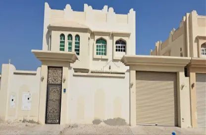 Outdoor Building image for: Villa - 7 Bedrooms - 5 Bathrooms for rent in Muaither Area - Doha, Image 1