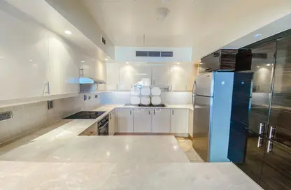 Kitchen image for: Apartment - 3 Bedrooms - 4 Bathrooms for rent in Carnaval - Qanat Quartier - The Pearl Island - Doha, Image 1