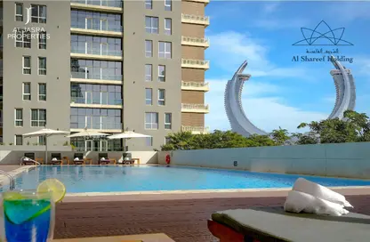 Pool image for: Apartment - 1 Bedroom - 2 Bathrooms for rent in Marina Residence 15 - Marina District - Lusail, Image 1