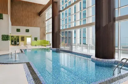 صورة لـ حوض سباحة شقة - 2 غرف نوم - 2 حمامات للايجار في Element City Center - Bulmasan Street - الخليج الغربي - الدوحة ، صورة رقم 1
