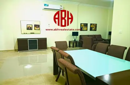 Dining Room image for: Apartment - 2 Bedrooms - 2 Bathrooms for rent in Al Mana Residence - Al Sadd - Doha, Image 1