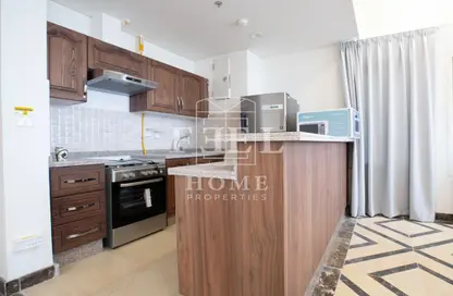 Kitchen image for: Apartment - 1 Bedroom - 2 Bathrooms for rent in Lusail City - Lusail, Image 1