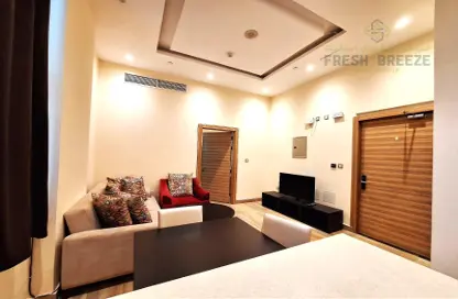 Room / Bedroom image for: Apartment - 1 Bedroom - 2 Bathrooms for rent in Al Sadd - Doha, Image 1