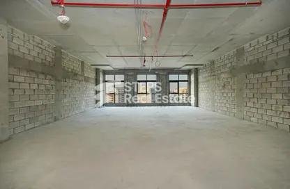 Office Space - Studio - 2 Bathrooms for rent in Jaidah Square - Grand Hamad - Doha