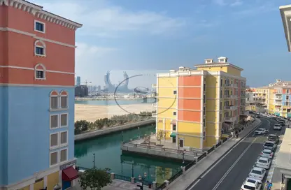 Outdoor Building image for: Apartment - 1 Bedroom - 1 Bathroom for sale in Carnaval - Qanat Quartier - The Pearl Island - Doha, Image 1