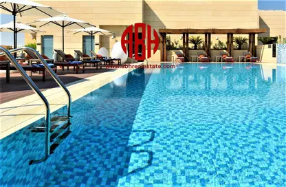 صورة لـ حوض سباحة شقة - غرفة نوم - 2 حمامات للايجار في الغانم القديم - الغانم - الدوحة ، صورة رقم 1