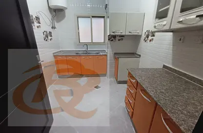 صورة لـ مطبخ شقة - 2 غرف نوم - 2 حمامات للايجار في بيفيرلي هيلز جاردن - طريق المطار القديم - الدوحة ، صورة رقم 1