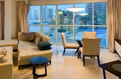 Living / Dining Room image for: Apartment - 1 Bedroom - 2 Bathrooms for sale in Burj Al Marina - Marina District - Lusail, Image 1